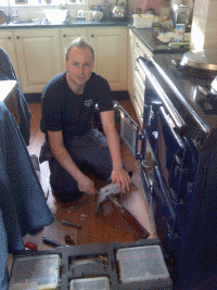 Martin at work servicing an Aga range cooker